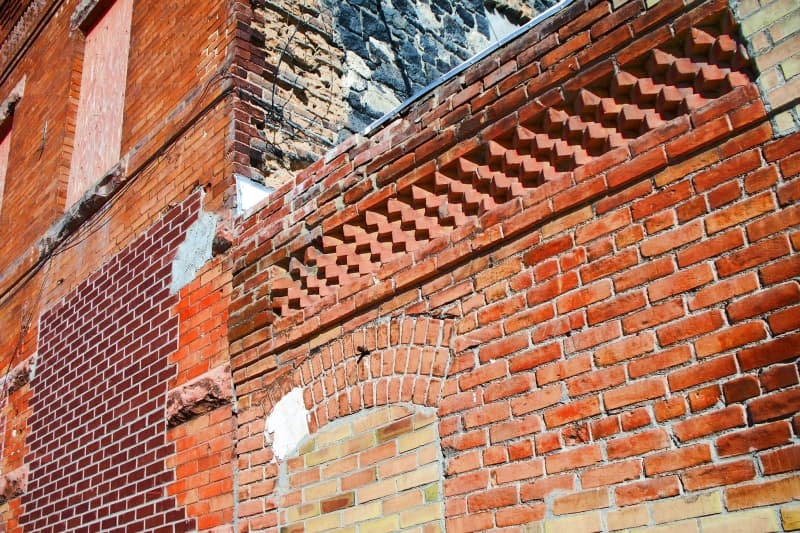 decorative brickwork on the side of a building